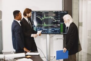 Finance executives reviewing business analytics and financial performance