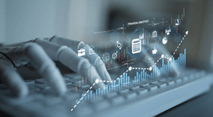 AI-powered financial analytics displayed over a laptop, with charts, graphs, and digital finance icons illustrating finance automation.