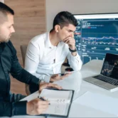 financial-consolidation-software Finance team reviewing financial data and reports