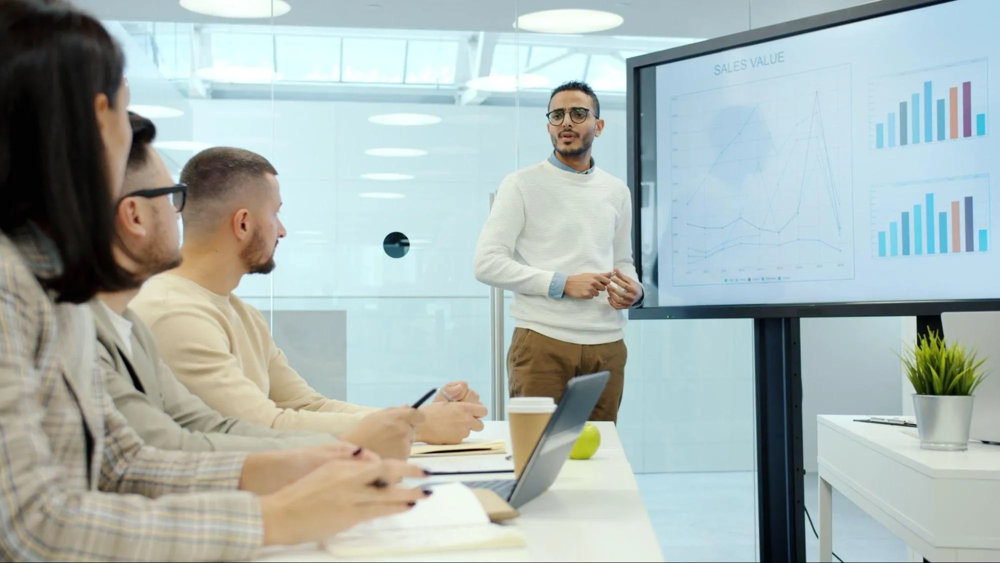 Finance stakeholders reviewing dashboards during a OneStream implementation